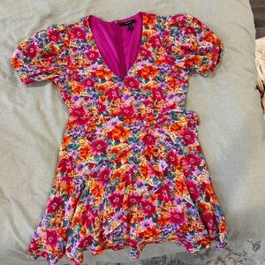 Floral pink ruffle mini faux wrap dress